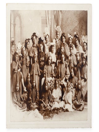 Item #21964 Mounted silver gelatin print studio portrait of the cast of a presumed school pageant...